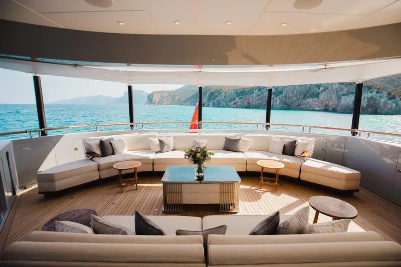 After You Yacht Photos Pics Luxurious Heesen 55m yacht interior with panoramic ocean view, featuring elegant seating and decor.