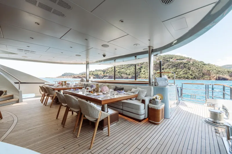 After You Yacht Photos Pics Luxurious outdoor dining area on 2011 Heesen 55m yacht with ocean view.
