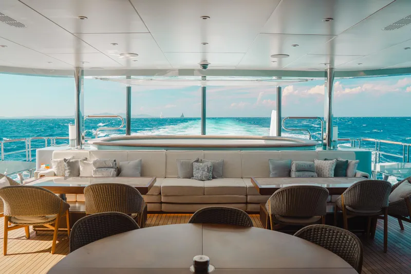 After You Yacht Photos Pics Luxurious Heesen 55m yacht interior with ocean view, featuring elegant seating and a jacuzzi, 2011 model.