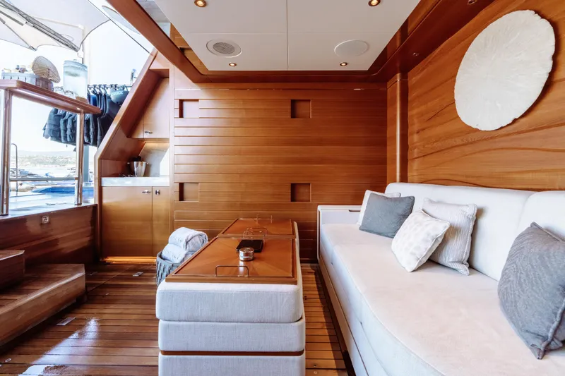After You Yacht Photos Pics Luxurious interior of 2011 Heesen 55m yacht with wooden paneling and plush seating.