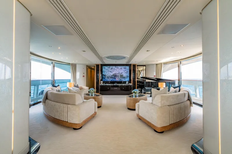 After You Yacht Photos Pics Luxurious interior of 2011 Heesen 55m yacht with elegant seating and large TV.