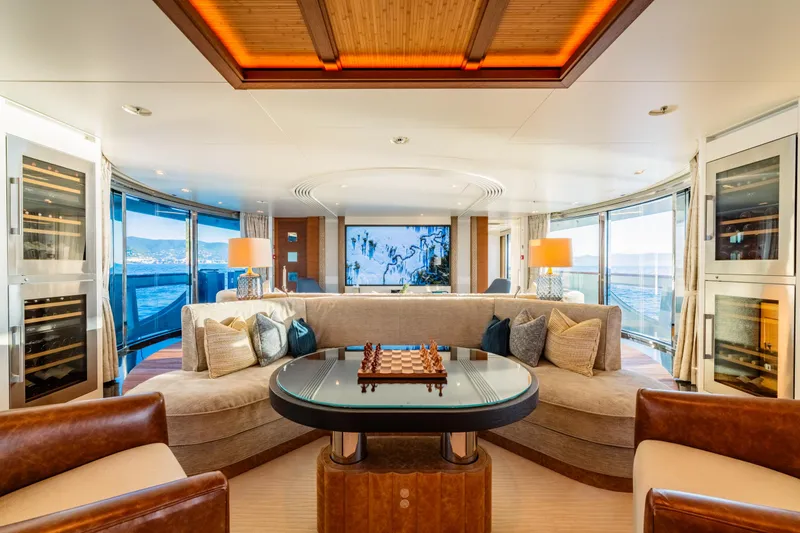 After You Yacht Photos Pics Luxurious interior of 2011 Heesen 55m yacht with elegant seating and chess table.