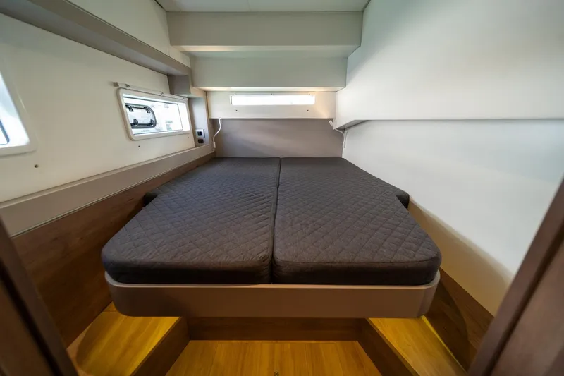 Cat Tales Yacht Photos Pics Cabin interior of 2022 Bali 4.2 yacht with double bed and wooden flooring.