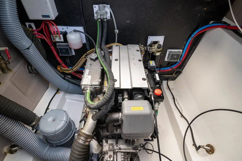 Cat Tales Yacht Photos Pics Engine compartment of a 2022 Bali 4.2, featuring wiring and hoses.