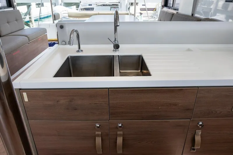 Cat Tales Yacht Photos Pics Modern kitchen sink on Bali 4.2 yacht, 2022 model, featuring dual basins and sleek design.