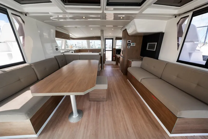 Cat Tales Yacht Photos Pics Spacious interior of 2022 Bali 4.2 yacht with modern seating and dining area.