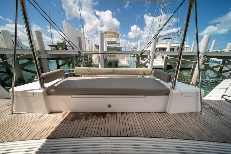 Cat Tales Yacht Photos Pics Bali 4.2 yacht deck, 2022 model, featuring a spacious seating area at the marina.