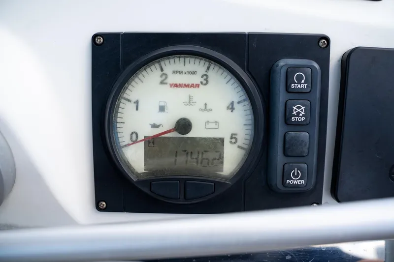 Cat Tales Yacht Photos Pics Tachometer and control panel on a 2022 Bali 4.2 boat dashboard.