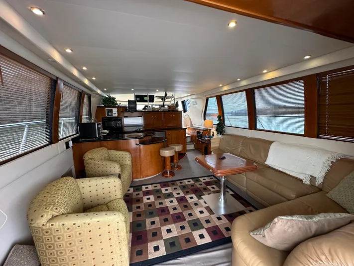  Yacht Photos Pics Luxurious interior of a 2001 Carver 570 Voyager Pilothouse yacht with modern furnishings.
