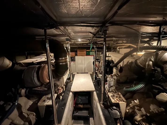  Yacht Photos Pics Engine room of a 2001 Carver 570 Voyager Pilothouse yacht.