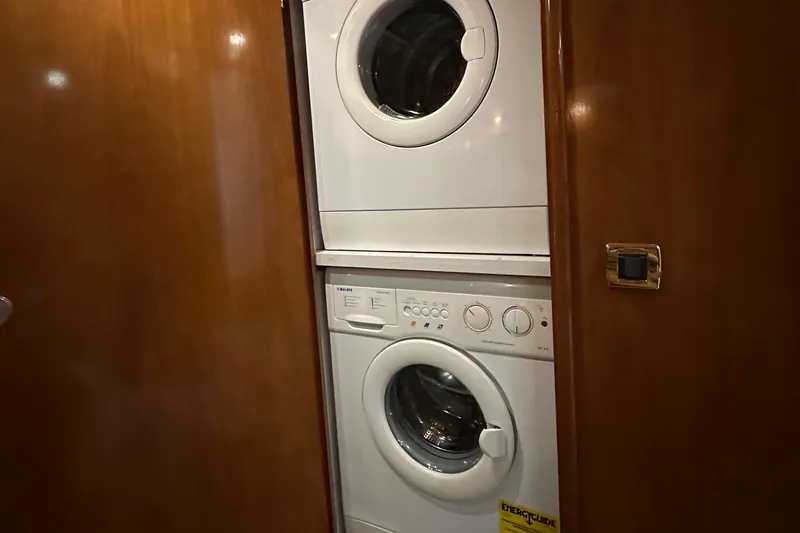  Yacht Photos Pics Stacked washer and dryer in 2001 Carver 570 Voyager Pilothouse yacht.