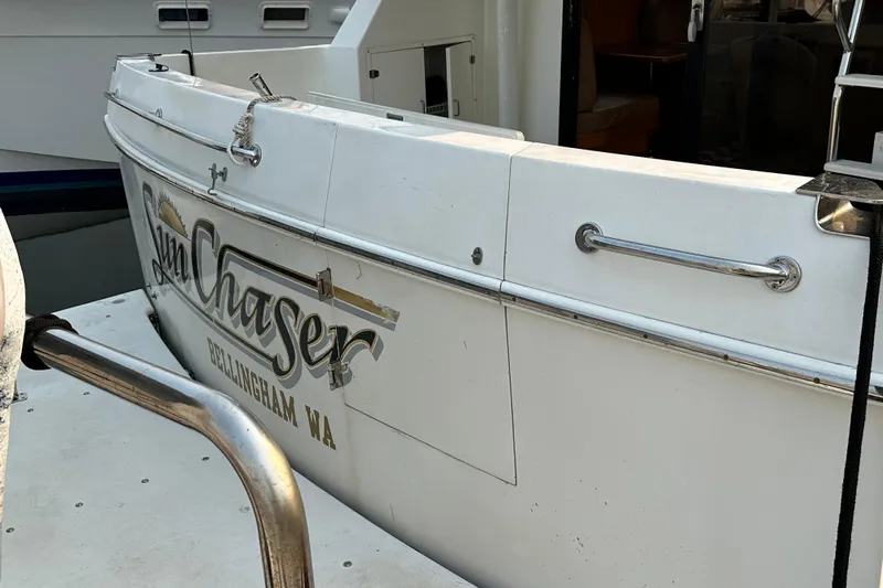 Sunchaser Yacht Photos Pics 1999 Hampton 490 yacht with "Sun Chaser" name, docked in Bellingham, WA.