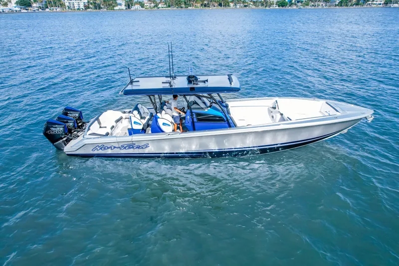  Yacht Photos Pics 2022 Nor-Tech 390 Center Console boat on calm blue water.