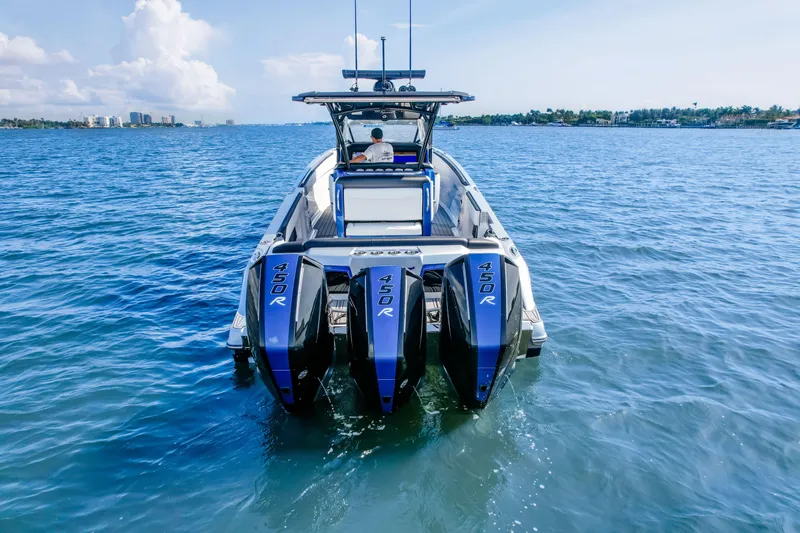  Yacht Photos Pics 2022 Nor-Tech 390 Center Console boat with four powerful 450R engines on open water.