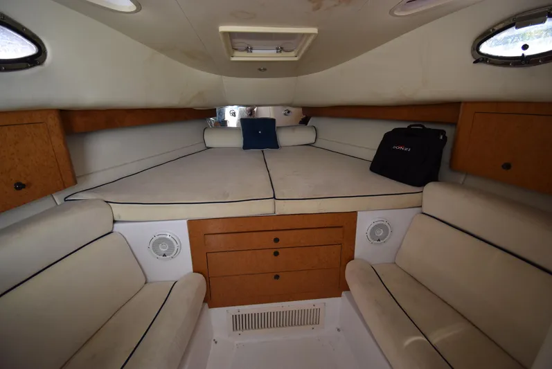 Tie Me Up Yacht Photos Pics Interior cabin of 2005 Donzi 38 ZSF boat with seating and storage.