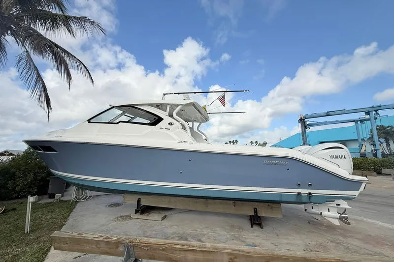 Salty Girl Yacht Photos Pics 2022 Pursuit DC 365 Dual Console boat on display, featuring Yamaha engines.