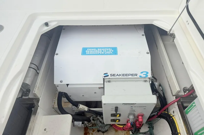 Salty Girl Yacht Photos Pics 2022 Pursuit DC 365 Dual Console with Seakeeper 3 stabilizer unit installed.