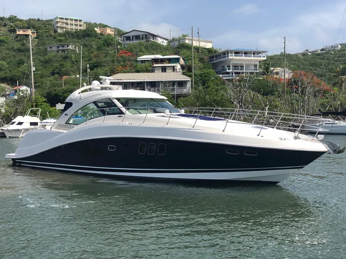 Highland Lass Yacht Photos Pics 2008 Sea Ray 55 Sundancer yacht docked in a scenic marina.