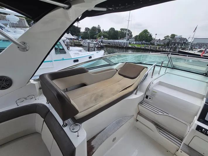 Knot On Call Yacht Photos Pics 2014 Sea Ray 350 Sundancer boat interior with seating and waterfront view.