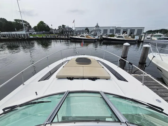 Knot On Call Yacht Photos Pics 2014 Sea Ray 350 Sundancer docked at marina, view from bow.