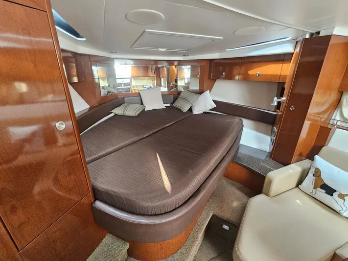 Knot On Call Yacht Photos Pics Luxurious interior of 2014 Sea Ray 350 Sundancer yacht with cozy bedding.