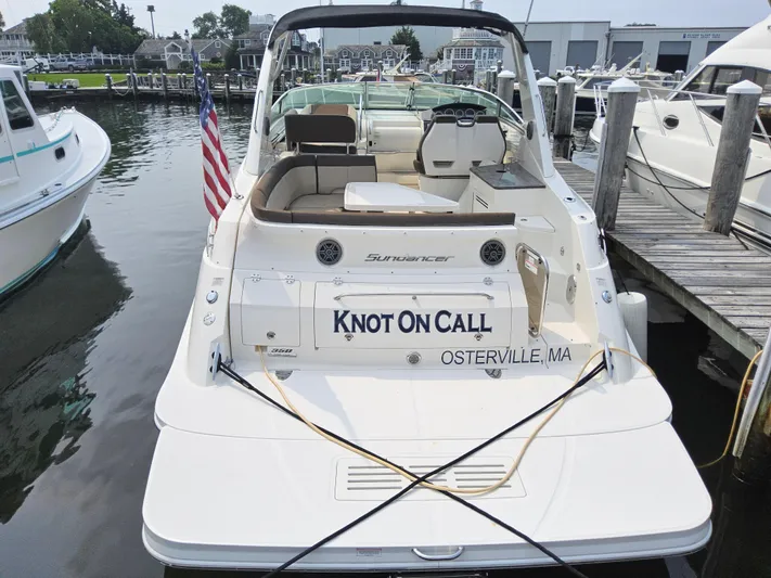 Knot On Call Yacht Photos Pics 2014 Sea Ray 350 Sundancer docked, rear view with "Knot On Call" name, Osterville, MA.