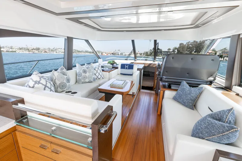 No Name Yacht Photos Pics Luxurious interior of 2017 Tiara Yachts 53 Coupe with elegant seating and scenic views.