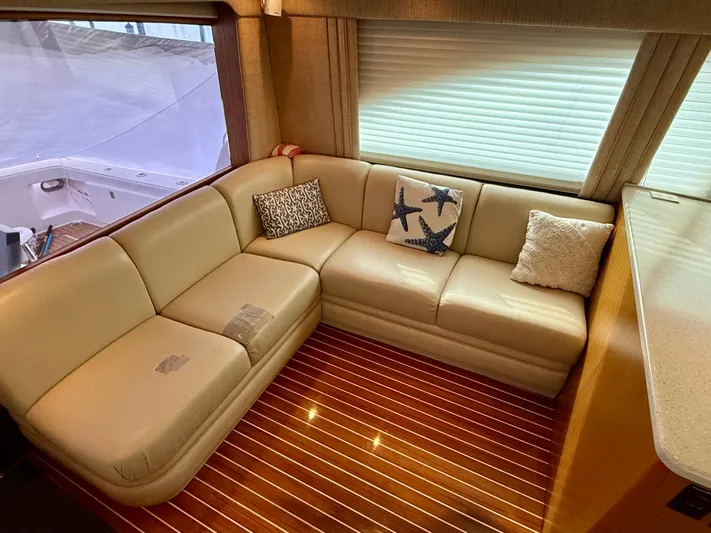 Split Decision Yacht Photos Pics Interior of 2005 Ocean Yachts 46 Super Sport with leather sofa.