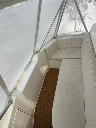 Split Decision Yacht Photos Pics Interior of 2005 Ocean Yachts 46 Super Sport with white seating.