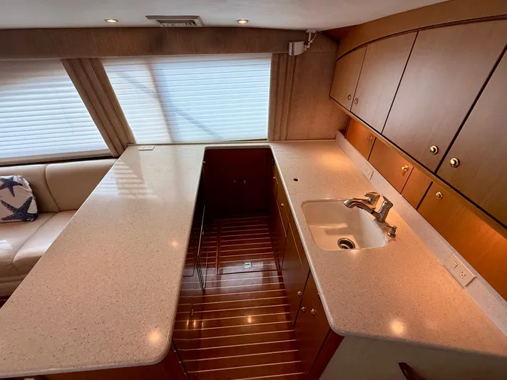 Split Decision Yacht Photos Pics Interior of 2005 Ocean Yachts 46 Super Sport featuring elegant kitchen.