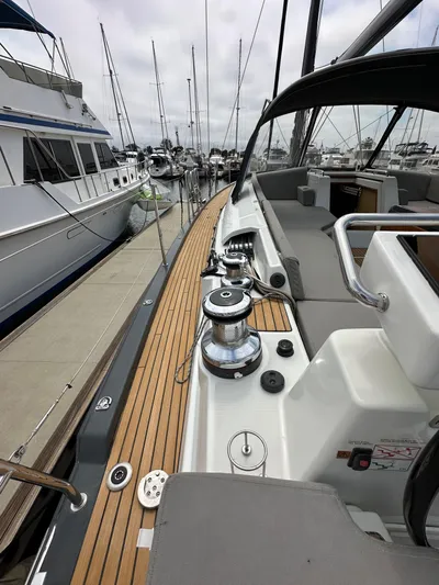 Edwina Yacht Photos Pics 2018 Jeanneau 54 yacht deck with winches, docked at marina.