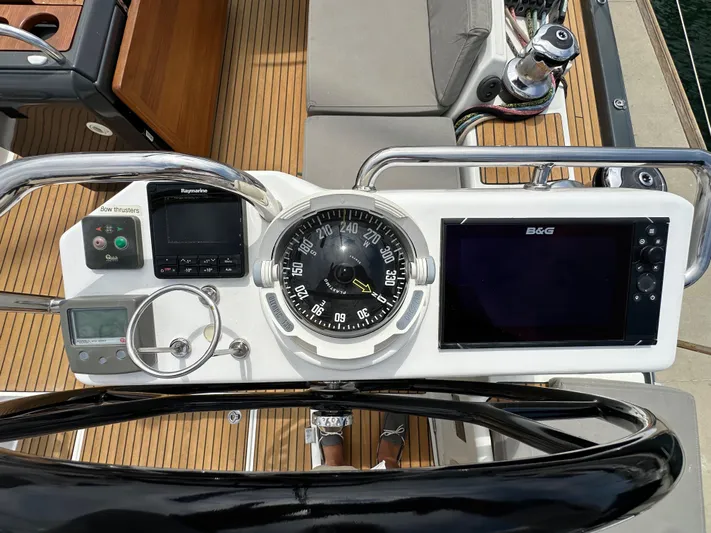 Edwina Yacht Photos Pics Cockpit of 2018 Jeanneau 54 sailboat with navigation instruments and compass.
