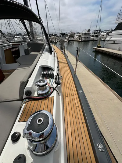 Edwina Yacht Photos Pics 2018 Jeanneau 54 yacht deck with winches, docked at marina.