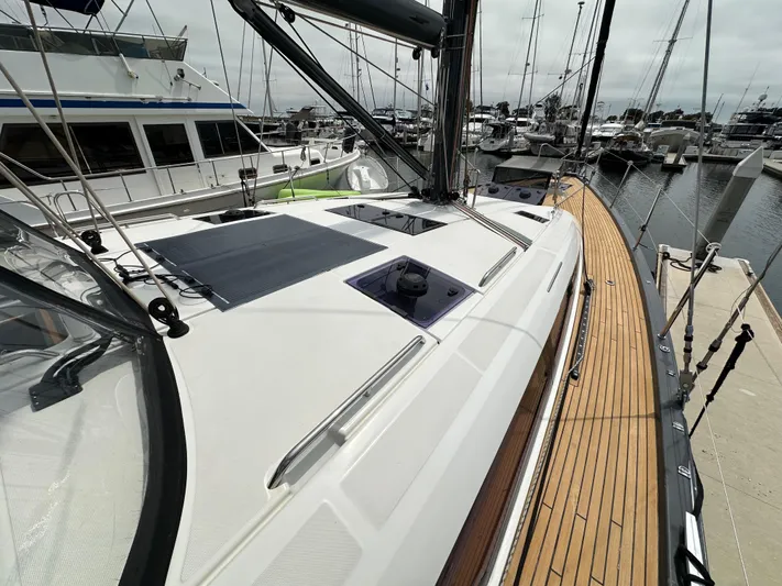 Edwina Yacht Photos Pics 2018 Jeanneau 54 yacht docked, showcasing sleek deck design and modern features.
