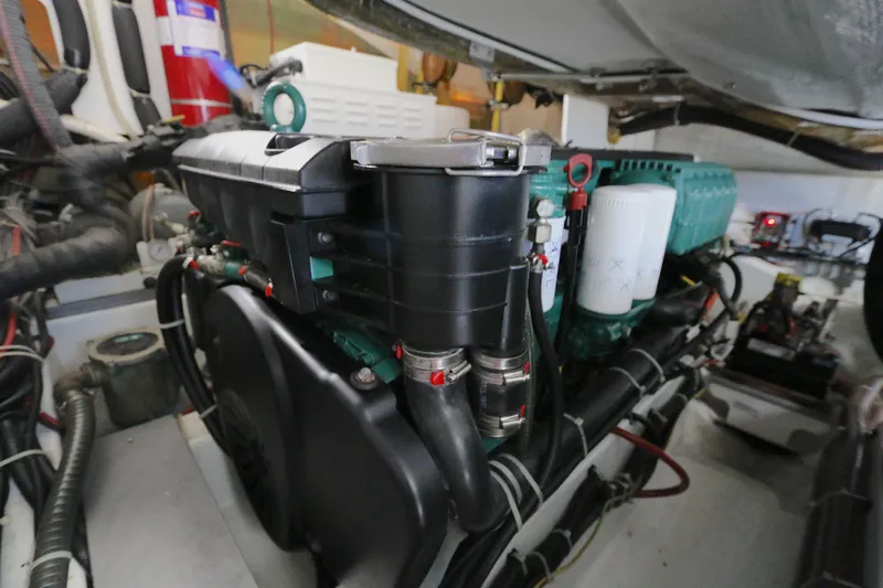 Gracia Yacht Photos Pics Engine room of 2019 Beneteau Gran Turismo 50 yacht, showcasing detailed machinery components.