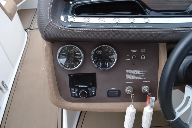 Nueve Yacht Photos Pics Cobalt 302 - Stereo and Engine Gauges