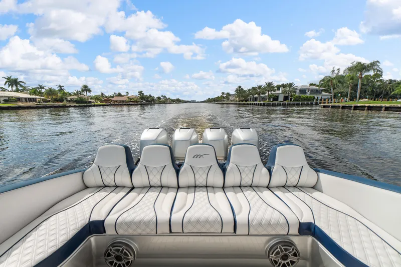  Yacht Photos Pics Luxury seating on 2017 Midnight Express 43 Open boat cruising a scenic waterway.