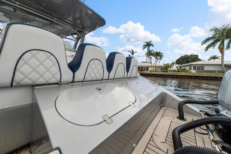  Yacht Photos Pics 2017 Midnight Express 43 Open boat interior with luxury seating and waterfront view.