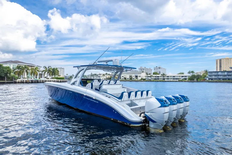  Yacht Photos Pics 2017 Midnight Express 43 Open boat on water, featuring sleek design and multiple engines.