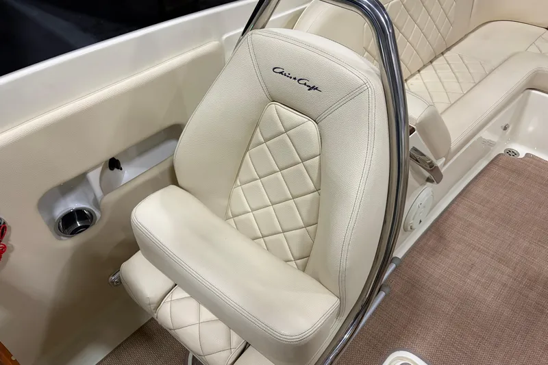  Yacht Photos Pics Luxurious interior of 2020 Chris-Craft Launch 28 GT with quilted leather seating.