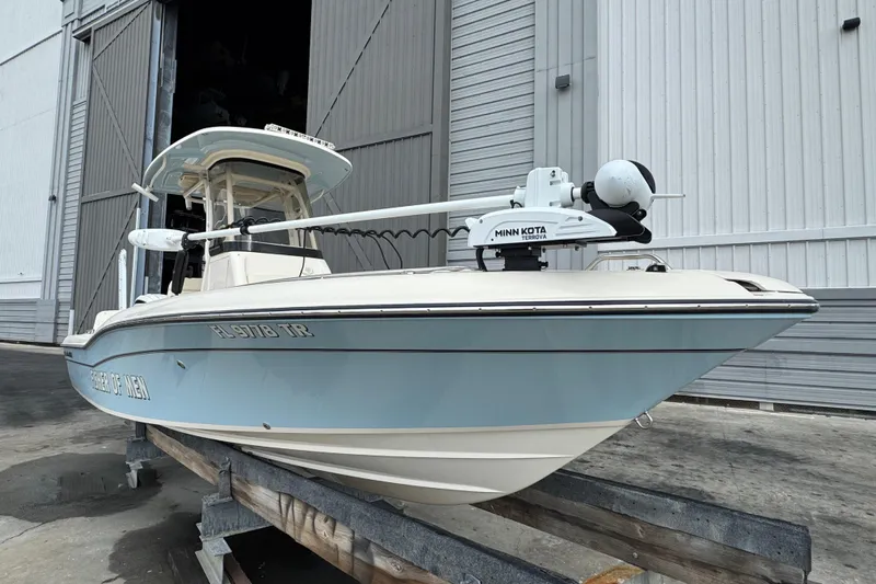  Yacht Photos Pics 2023 Grady-White 251 Coastal Explorer boat on trailer, featuring Minn Kota Terrova motor.