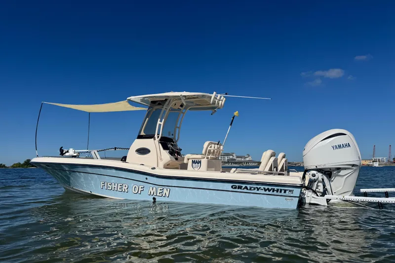 Yacht Photos Pics 2023 Grady-White 251 Coastal Explorer boat with Yamaha engine on calm water.