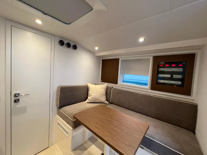 Stanislas Michel Yacht Photos Pics Interior of 2025 Itama 45 RS yacht with cozy seating and modern design.