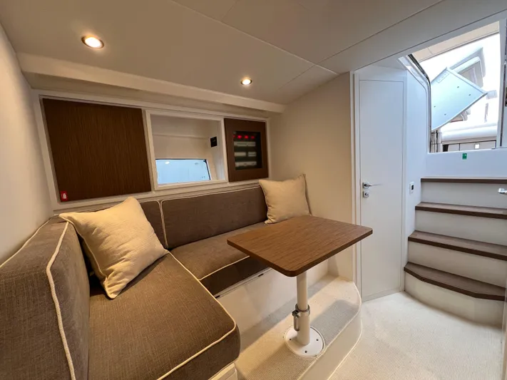 Stanislas Michel Yacht Photos Pics Luxurious interior of 2025 Itama 45 RS yacht with cozy seating and modern design.