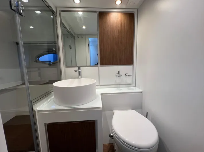 Stanislas Michel Yacht Photos Pics Modern bathroom interior of 2025 Itama 45 RS yacht with sleek design elements.