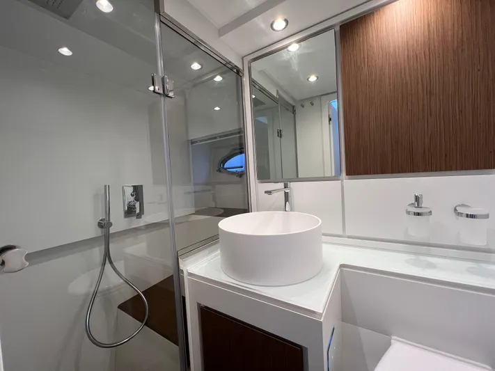 Stanislas Michel Yacht Photos Pics Modern bathroom interior on 2025 Itama 45 RS yacht, featuring sleek design and fixtures.