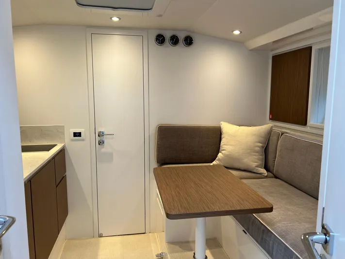 Stanislas Michel Yacht Photos Pics Interior of 2025 Itama 45 RS yacht with cozy seating and modern design.