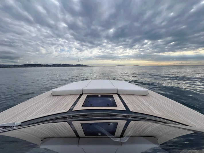 Stanislas Michel Yacht Photos Pics Itama 45 RS yacht on calm sea under dramatic cloudy sky, 2025 model.