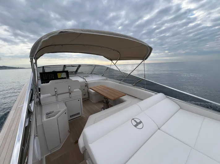 Stanislas Michel Yacht Photos Pics 2025 Itama 45 RS yacht with spacious deck and elegant seating under a canopy.