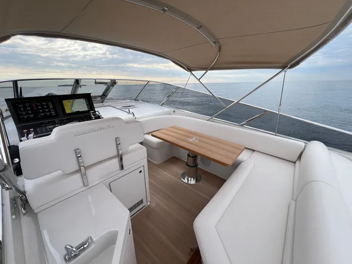 Stanislas Michel Yacht Photos Pics Luxurious Itama 45 RS yacht interior with elegant seating and ocean view, 2025 model.